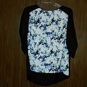 Light weight, quarter length blouse.